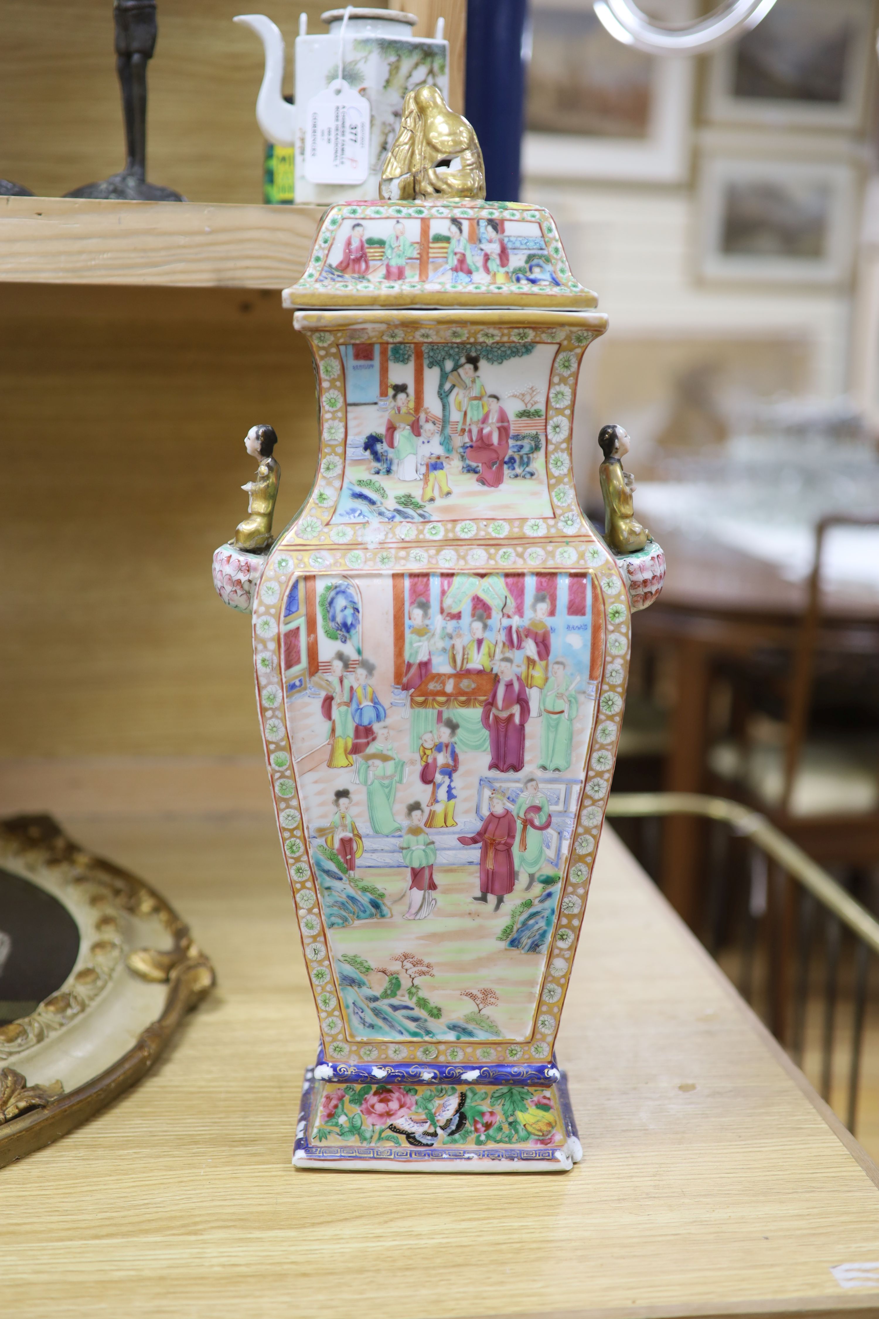 A large Chinese famille rose Canton decorated vase and cover, Daoguang period, height 53cm (a.f)